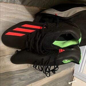 Adidas Black and Red Athletic Shoes with Modern Design